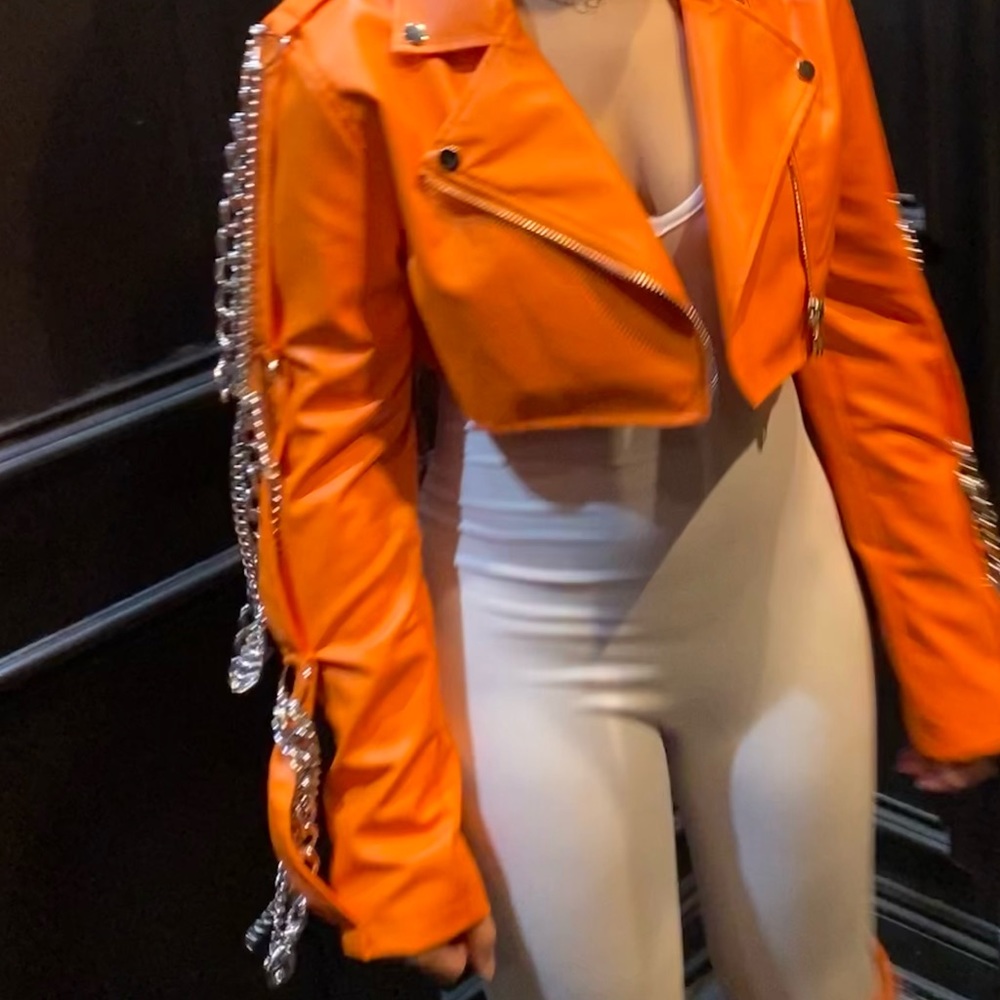 Orange leather jacket with chains